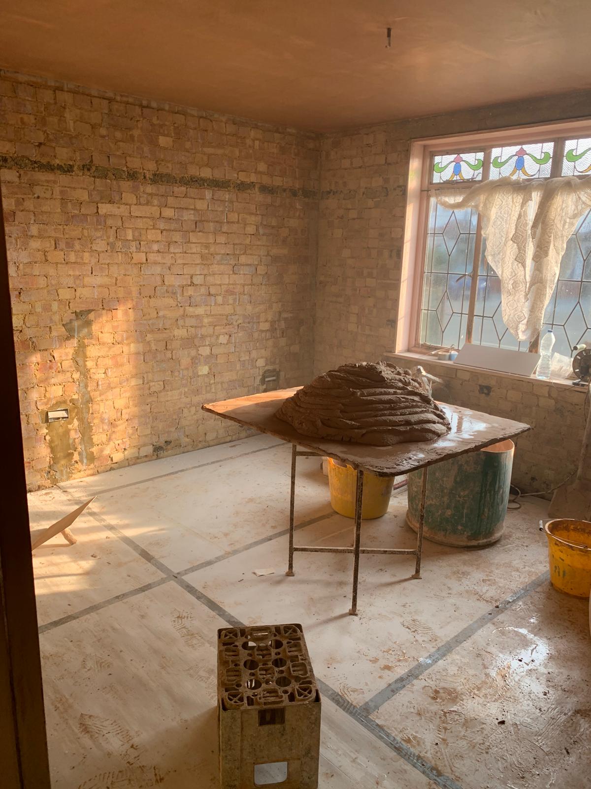 Freshly plastered walls and ceiling in a room