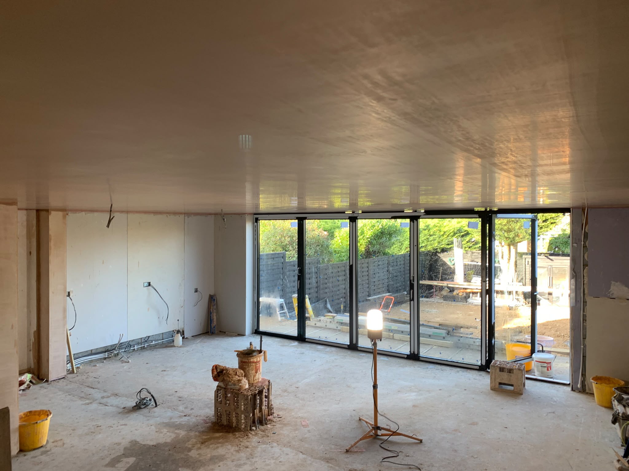 Large plastered extension with bifold doors