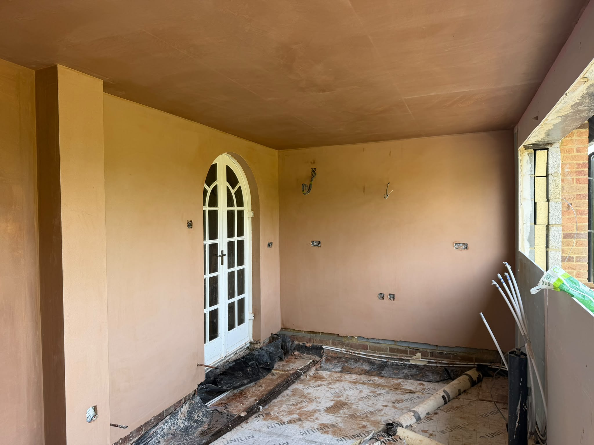 Finished plastering in a kitchen extension