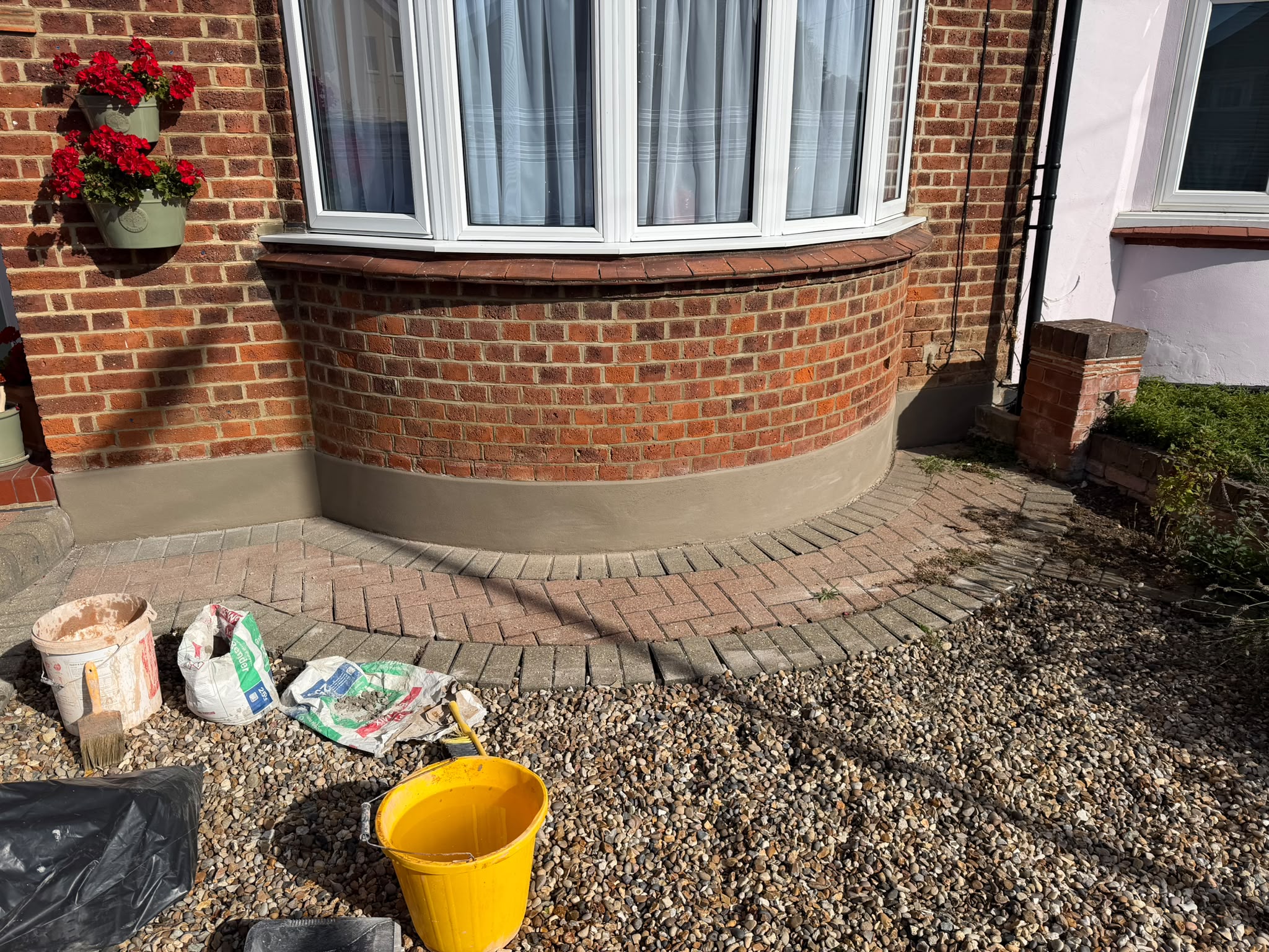 External plinth rendering — project photo 1